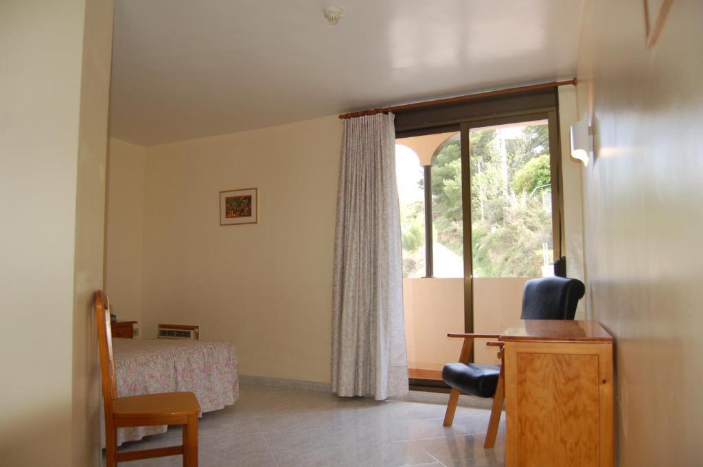 Hotel Llucena Lucena del Cid Bilik gambar